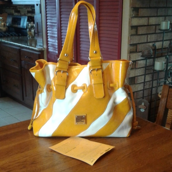 Dooney & Bourke Handbags - Dooney and Bourke yellow shoulder bag